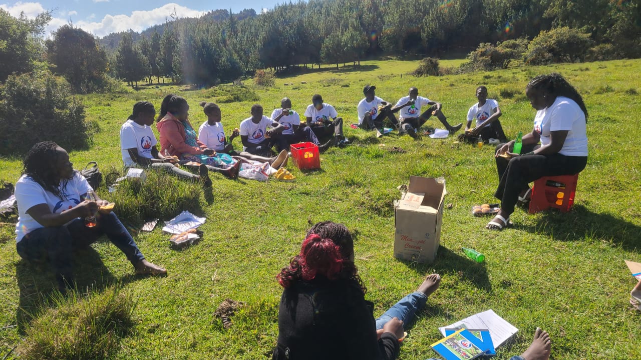 Tambul youth collaborating during a planning session